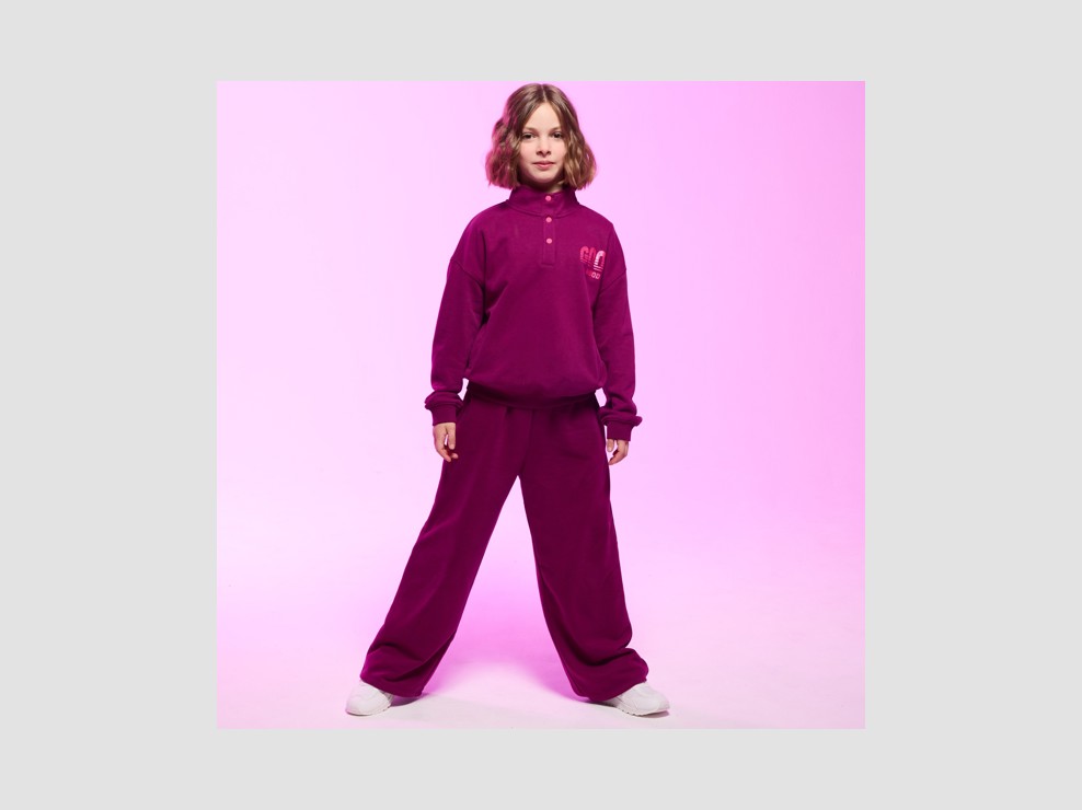 Jogging en molleton uni coupe large violet Fille 1