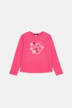 T-shirt manches longues motif cœur rose Fille