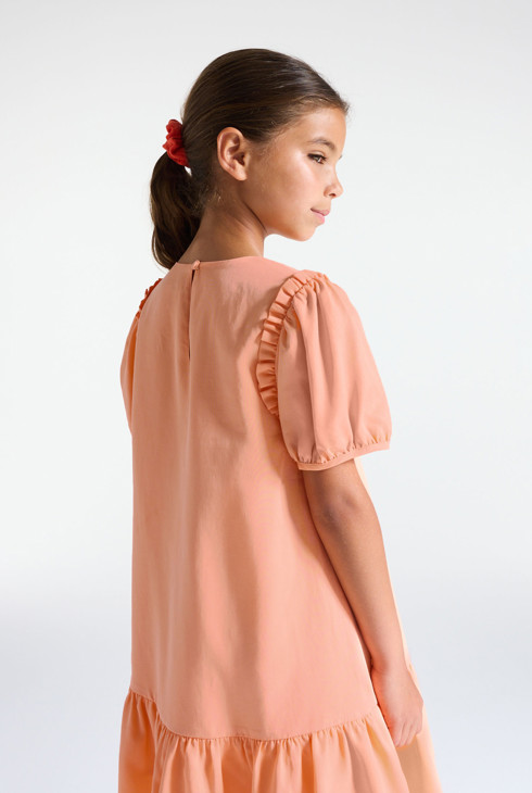 Kleid einfarbig mit Rüschen pastellorange Mädchen 2