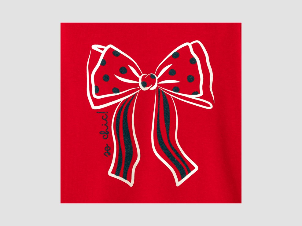 Czerwona bluzka z golfem z kokardą dla dziewczynki 2