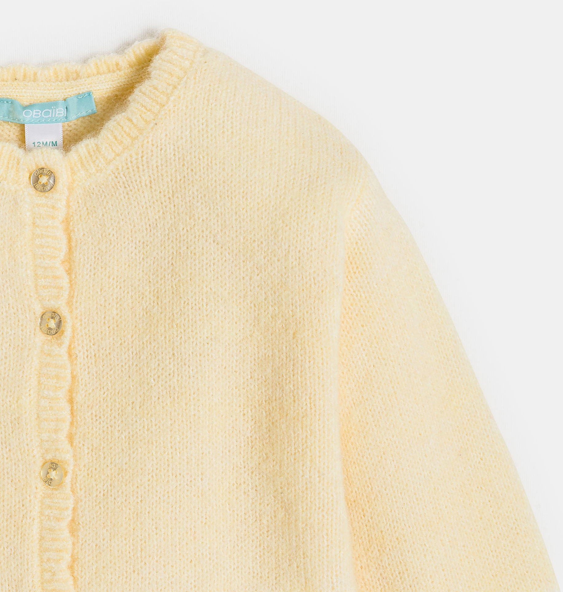 Gilet jaune en maille bébé fille