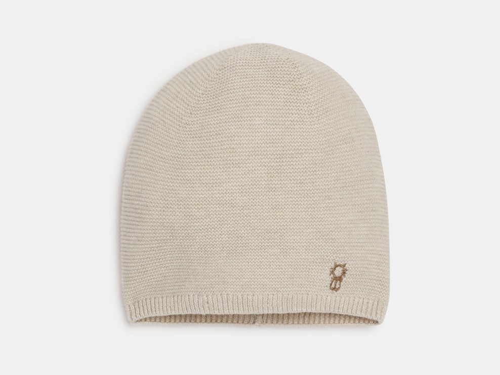 Beige muts van geribbeld tricot voor pasgeborenen 1