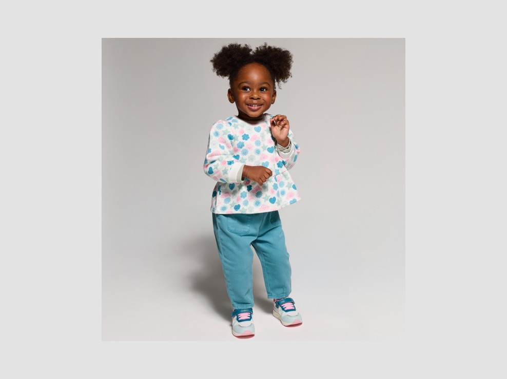 Witte sweater met opdruk voor babymeisjes 1