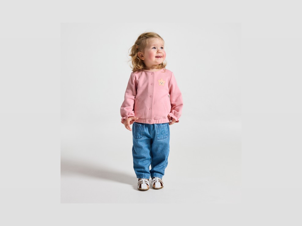 Maglia in tessuto felpato rosa neonata 1