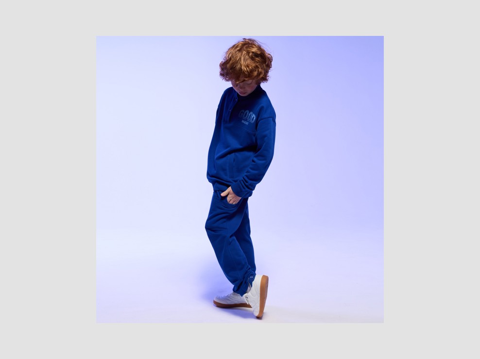 Niebieskie spodnie dresowe z kieszeniami dla chłopca 1