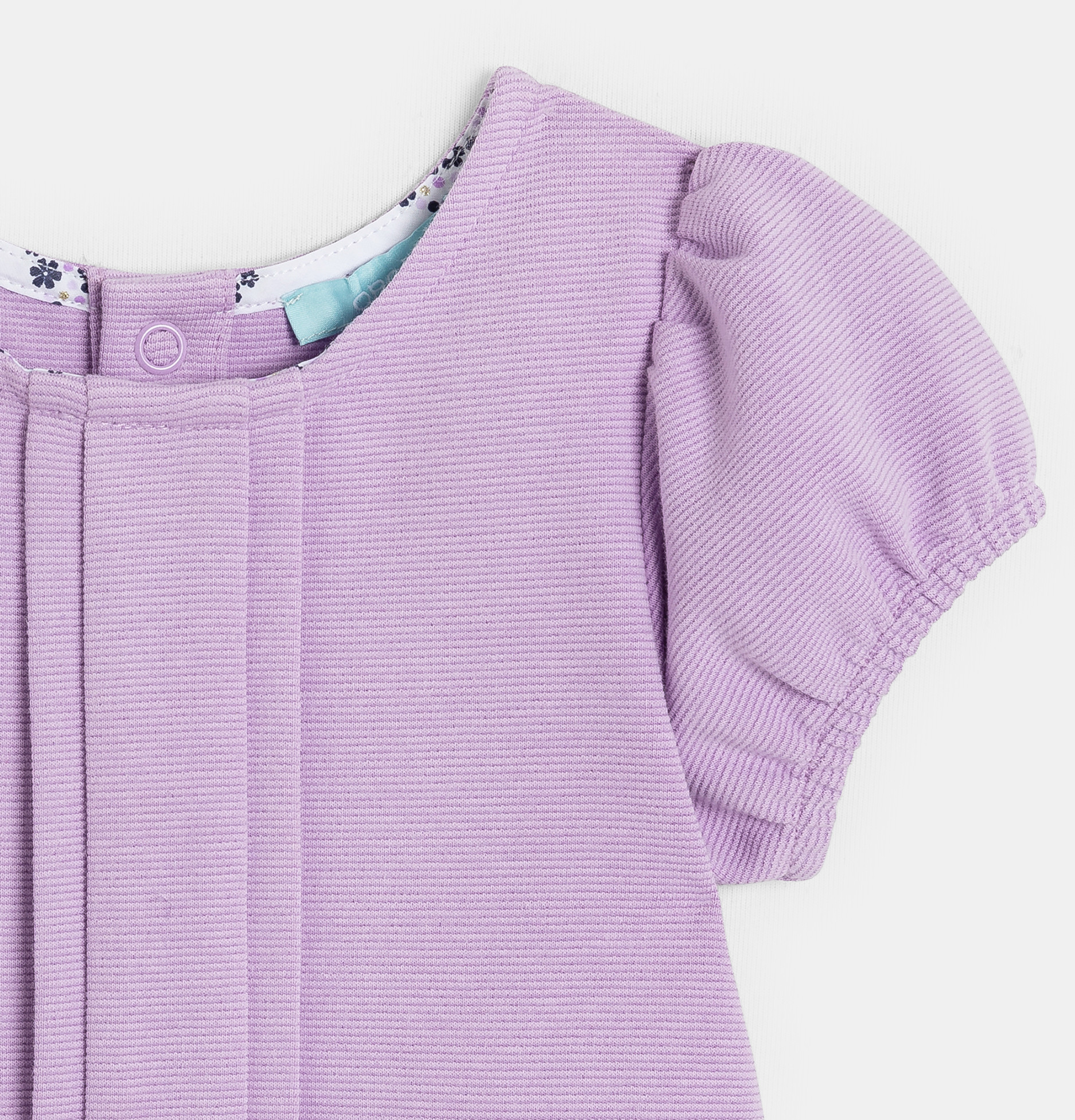 Combinaison courte violette bébé fille