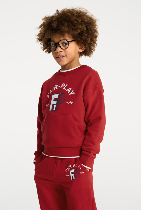 Jersey de muletón con bolsillo rojo niño 1