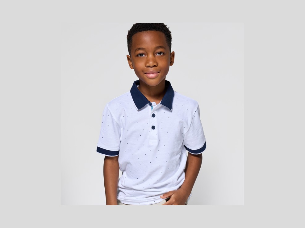 Polo in maglia piqué bianca a pois bambino 1