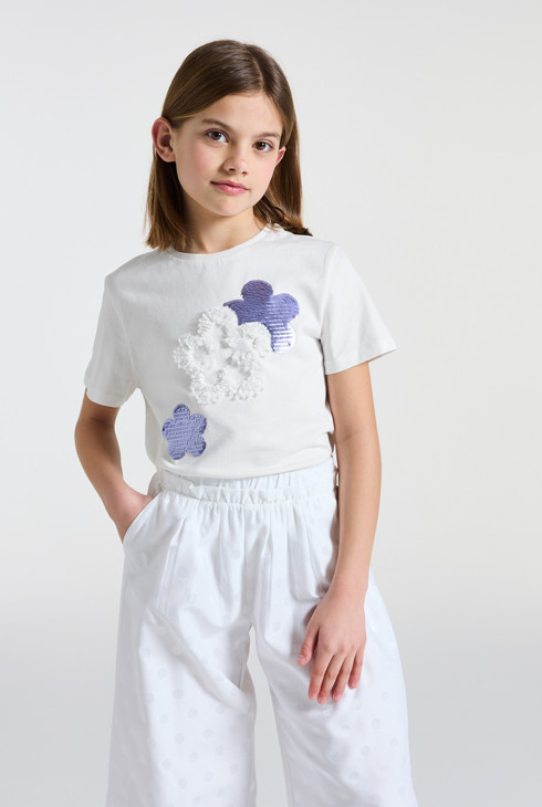 Camiseta blanca con flores y lentejuelas para niña 1