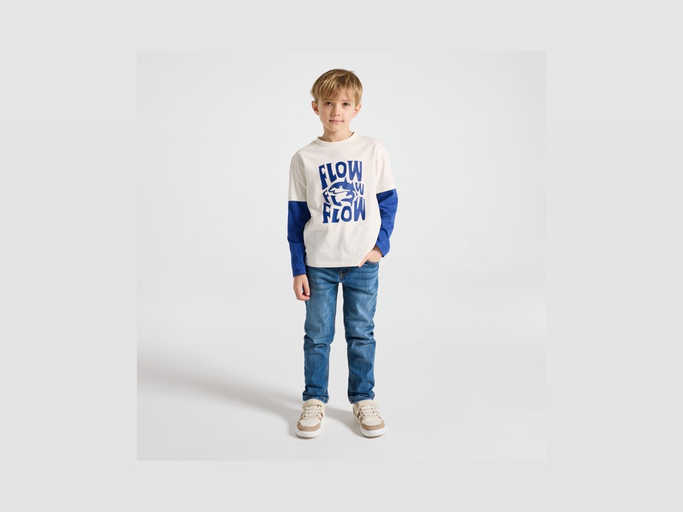 T-shirt bianca e blu con squalo bambino 1