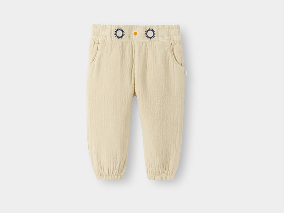 Pantaloni in garza di cotone beige neonata 1
