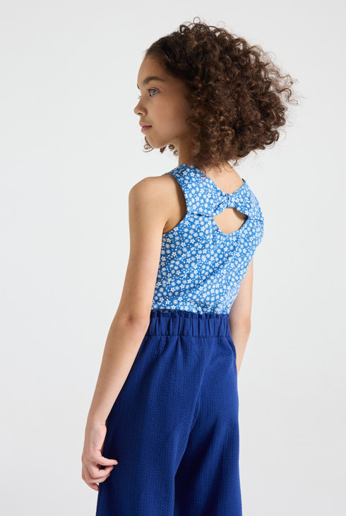 Camiseta sin mangas azul con estampado floral para niña 1