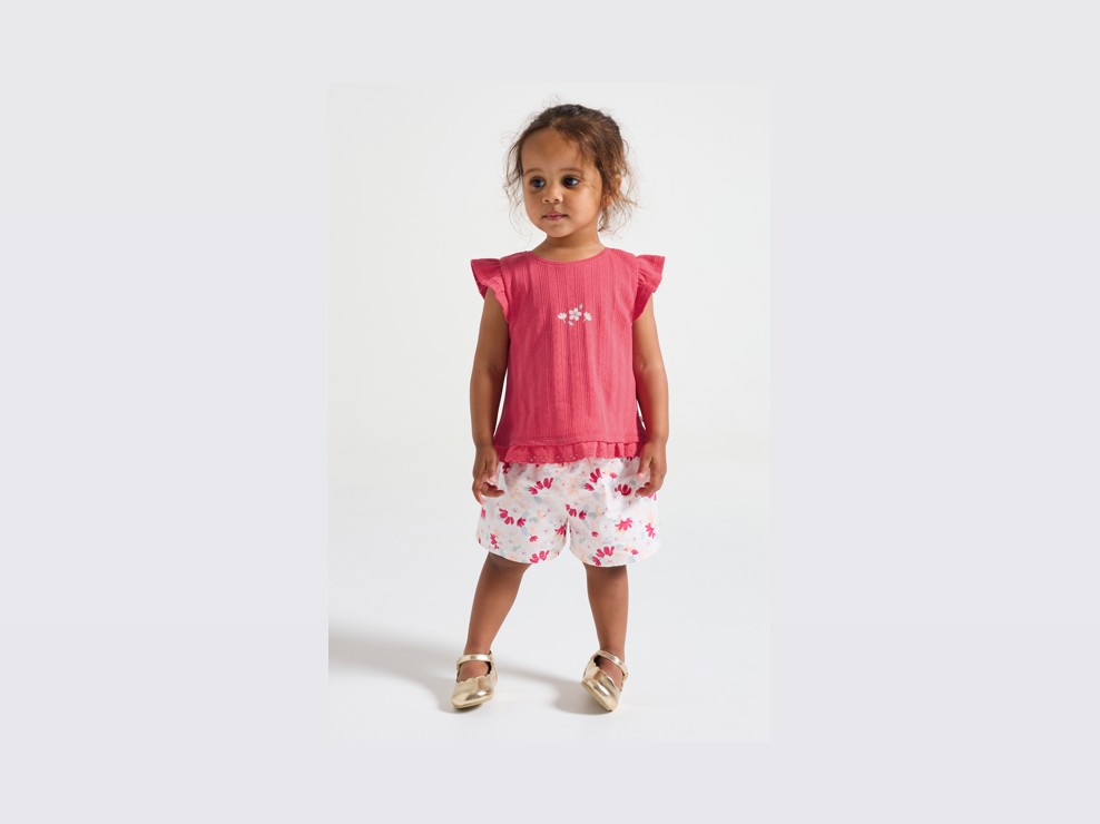 Camiseta de punto calado rosa para bebé niña 1