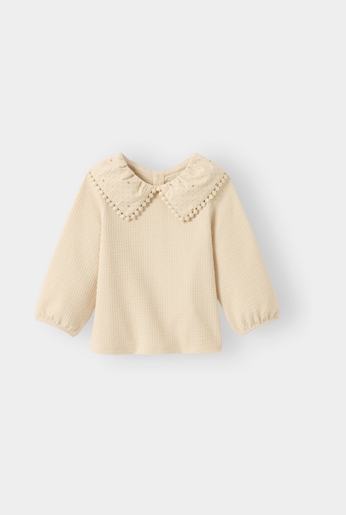 Blusa beix per a nena 1