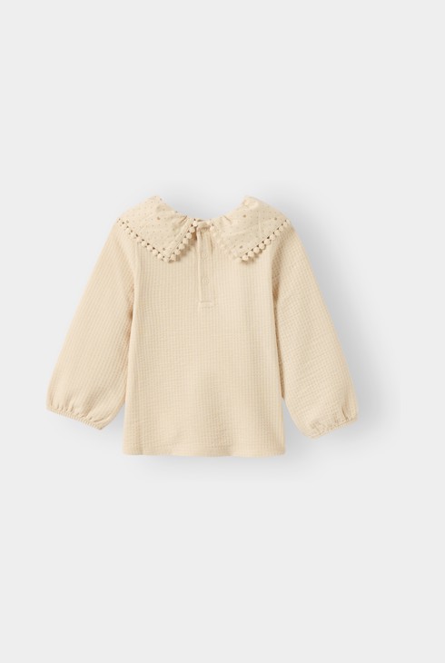 Blusa beix per a nena 2